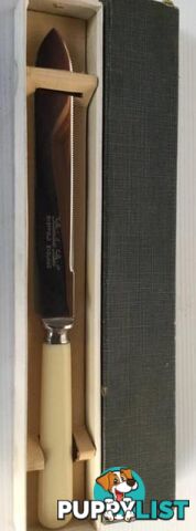 Vintage bread knife in original box 1960s stamped stainless steel