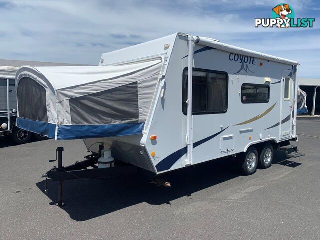 COYOTE SLIDE OUT EXPANDER CARAVAN