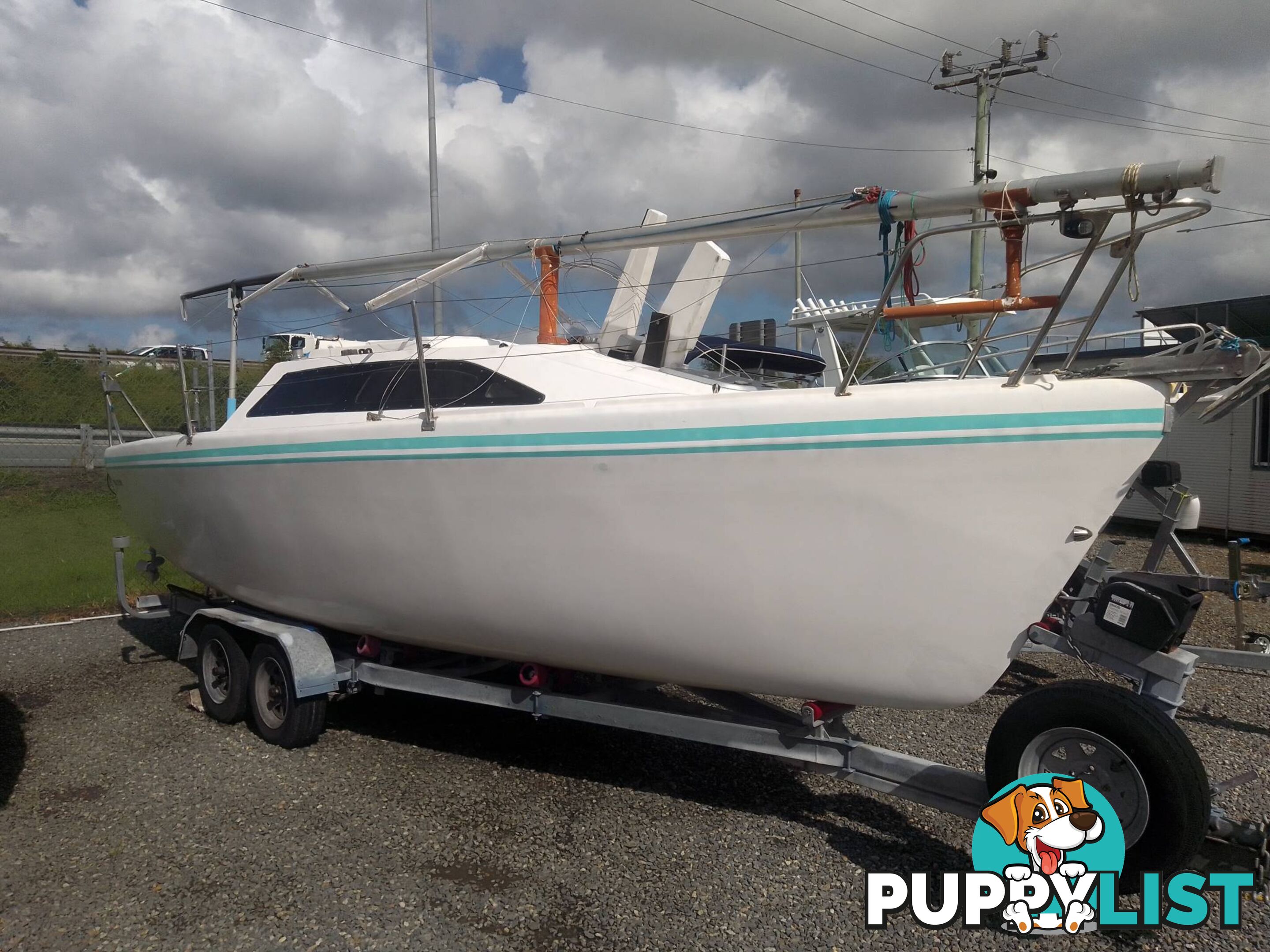 BLAZER 740 TRAILER SAILOR 7.4M SAIL BOAT -15HP YAMAHA 2 STROKE OUTBOARD AND TRAILER