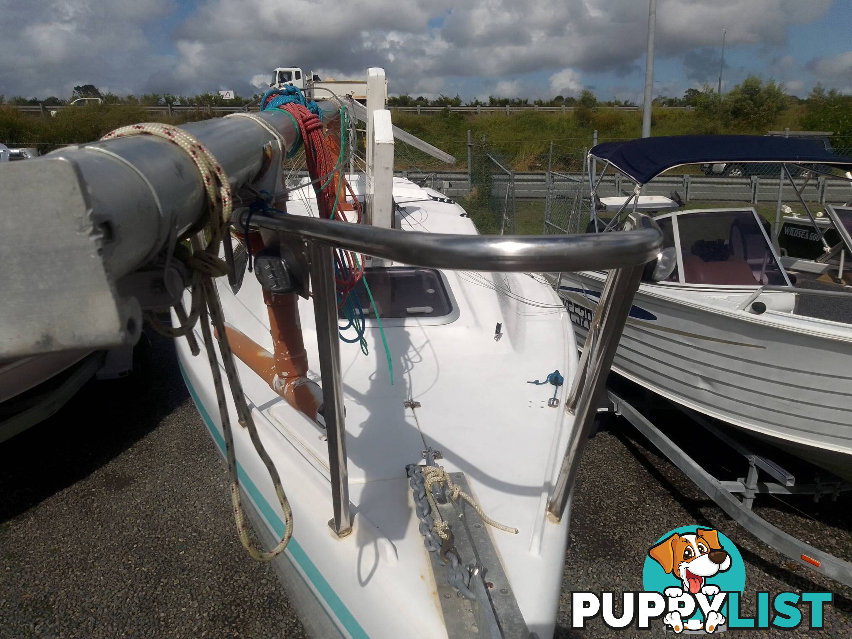 BLAZER 740 TRAILER SAILOR 7.4M SAIL BOAT -15HP YAMAHA 2 STROKE OUTBOARD AND TRAILER