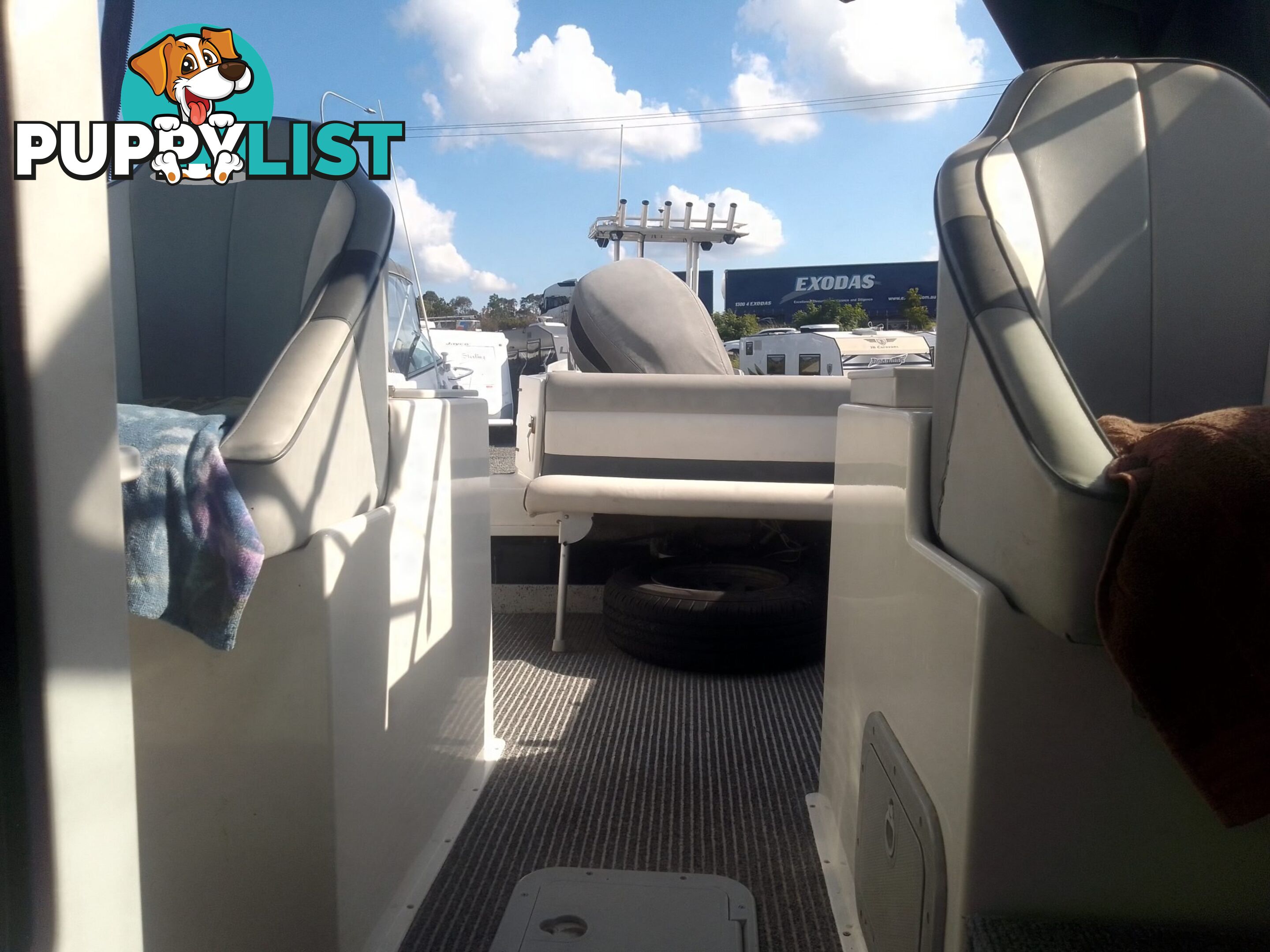 USED HAINES HUNTER 680C HALF CABIN WITH A 2005 SUZUKI 200HP 4 STROKE OUTBOARD ON A 2020 SWIFTCO DUAL AXLE TRAILER