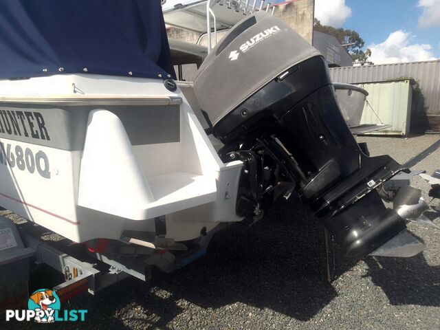 USED HAINES HUNTER 680C HALF CABIN WITH A 2005 SUZUKI 200HP 4 STROKE OUTBOARD ON A 2020 SWIFTCO DUAL AXLE TRAILER
