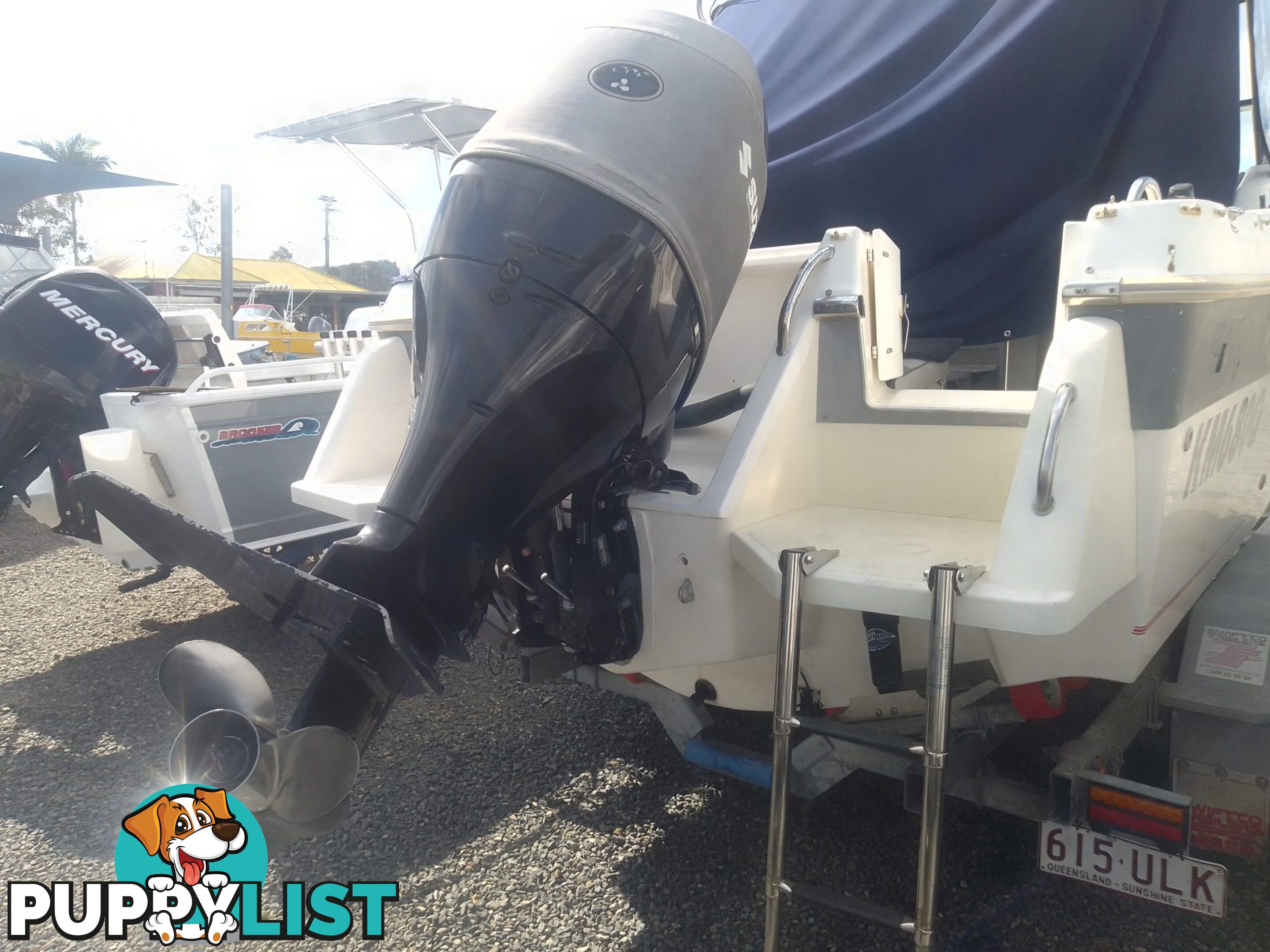 USED HAINES HUNTER 680C HALF CABIN WITH A 2005 SUZUKI 200HP 4 STROKE OUTBOARD ON A 2020 SWIFTCO DUAL AXLE TRAILER