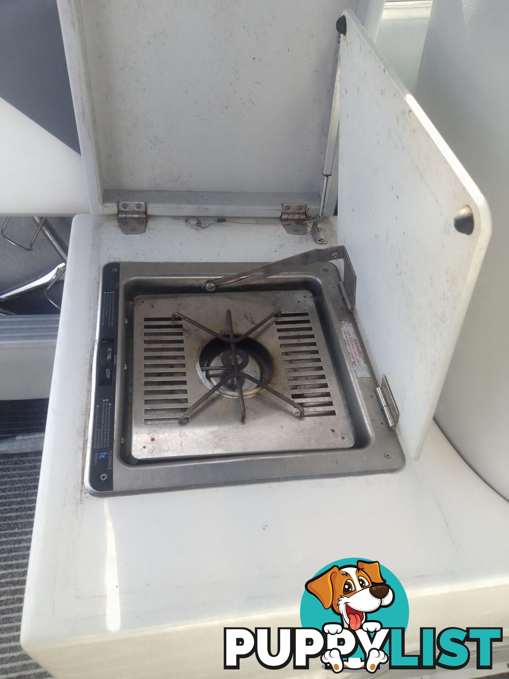 USED HAINES HUNTER 680C HALF CABIN WITH A 2005 SUZUKI 200HP 4 STROKE OUTBOARD ON A 2020 SWIFTCO DUAL AXLE TRAILER