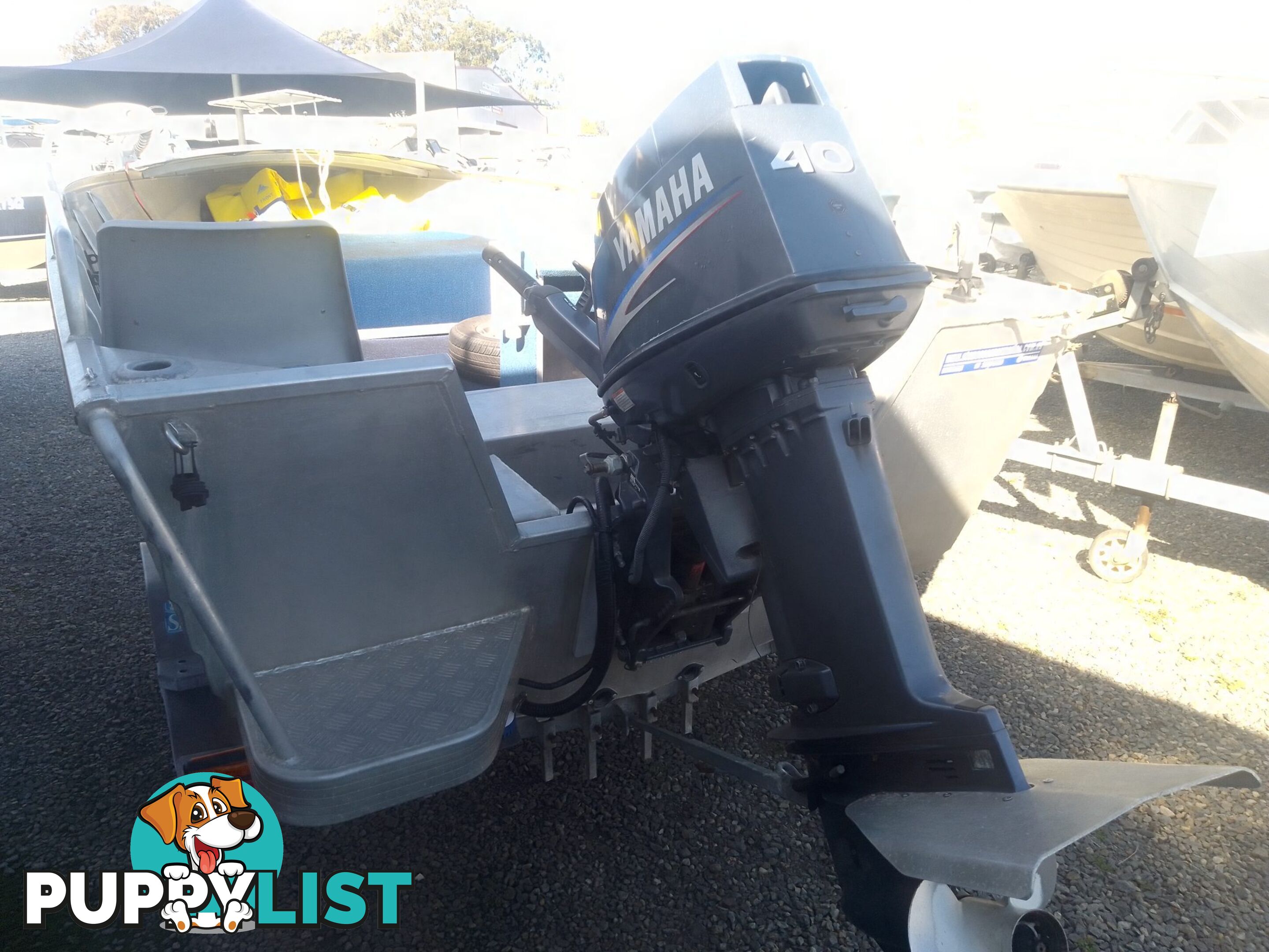 USED SEAJAY MAGNUM 4.35M OPEN DINGHY WITH A 2012 40HP YAMAHA OUTBOARD ON A 2002 REDCO SINGLE AXLE BOAT TRAILER