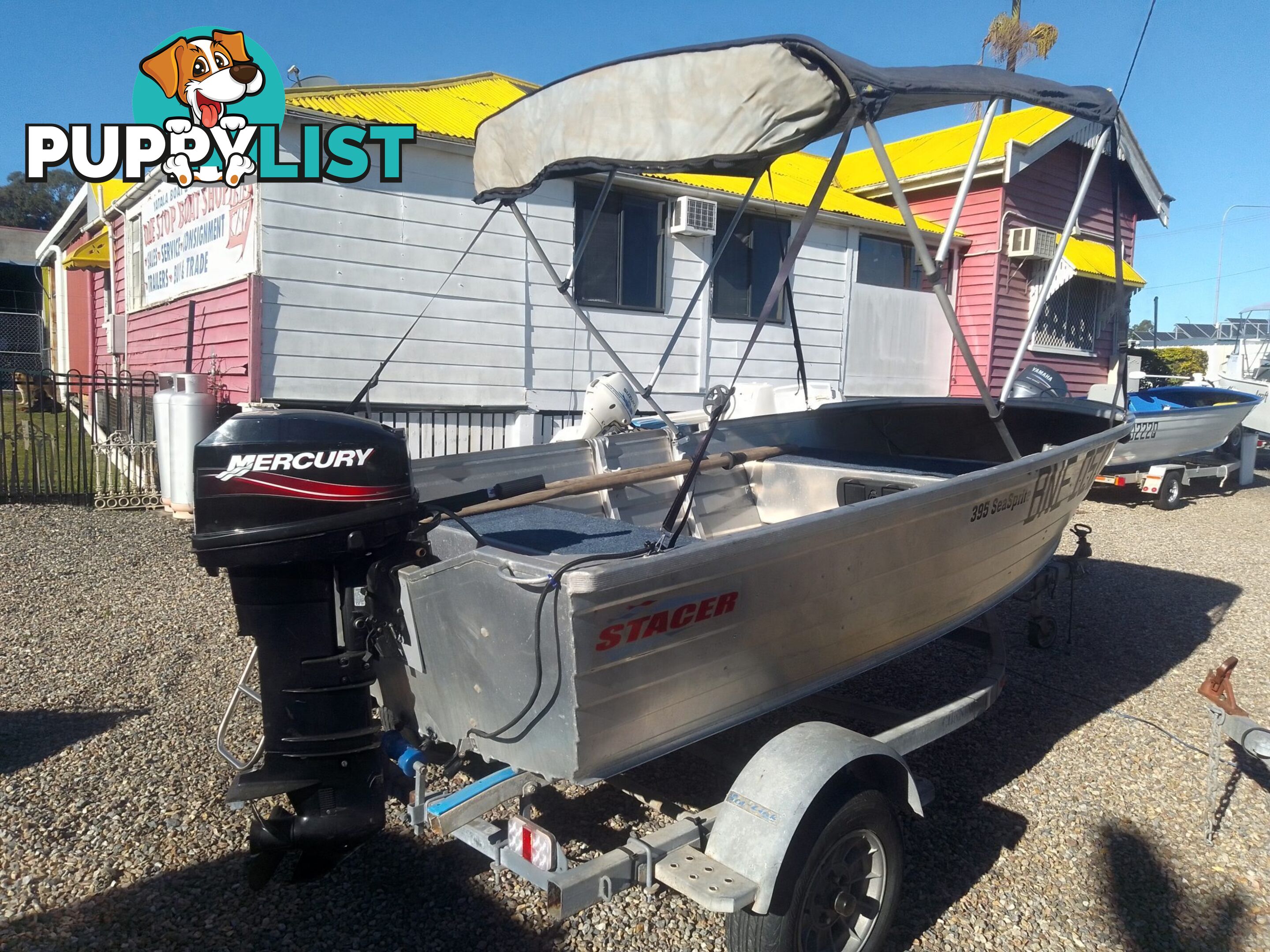 USED 2008 STACER 395 SEASPRITE OPEN DINGHY WITH A MERCURY 25HP OUTBOARD ON A 2003 SEALINK SINGLE AXLE TRAILER.