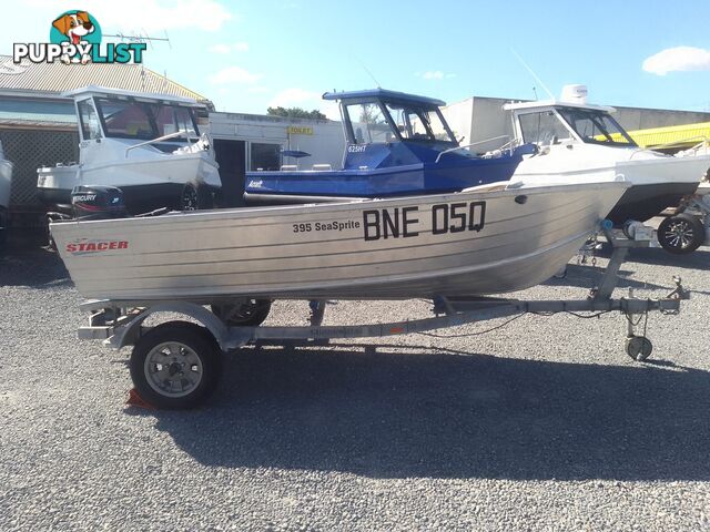 USED 2008 STACER 395 SEASPRITE OPEN DINGHY WITH A MERCURY 25HP OUTBOARD ON A 2003 SEALINK SINGLE AXLE TRAILER.