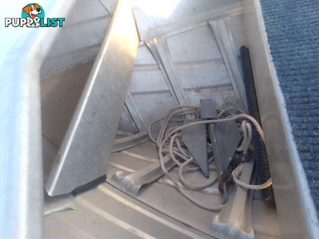 USED 2008 STACER 395 SEASPRITE OPEN DINGHY WITH A MERCURY 25HP OUTBOARD ON A 2003 SEALINK SINGLE AXLE TRAILER.
