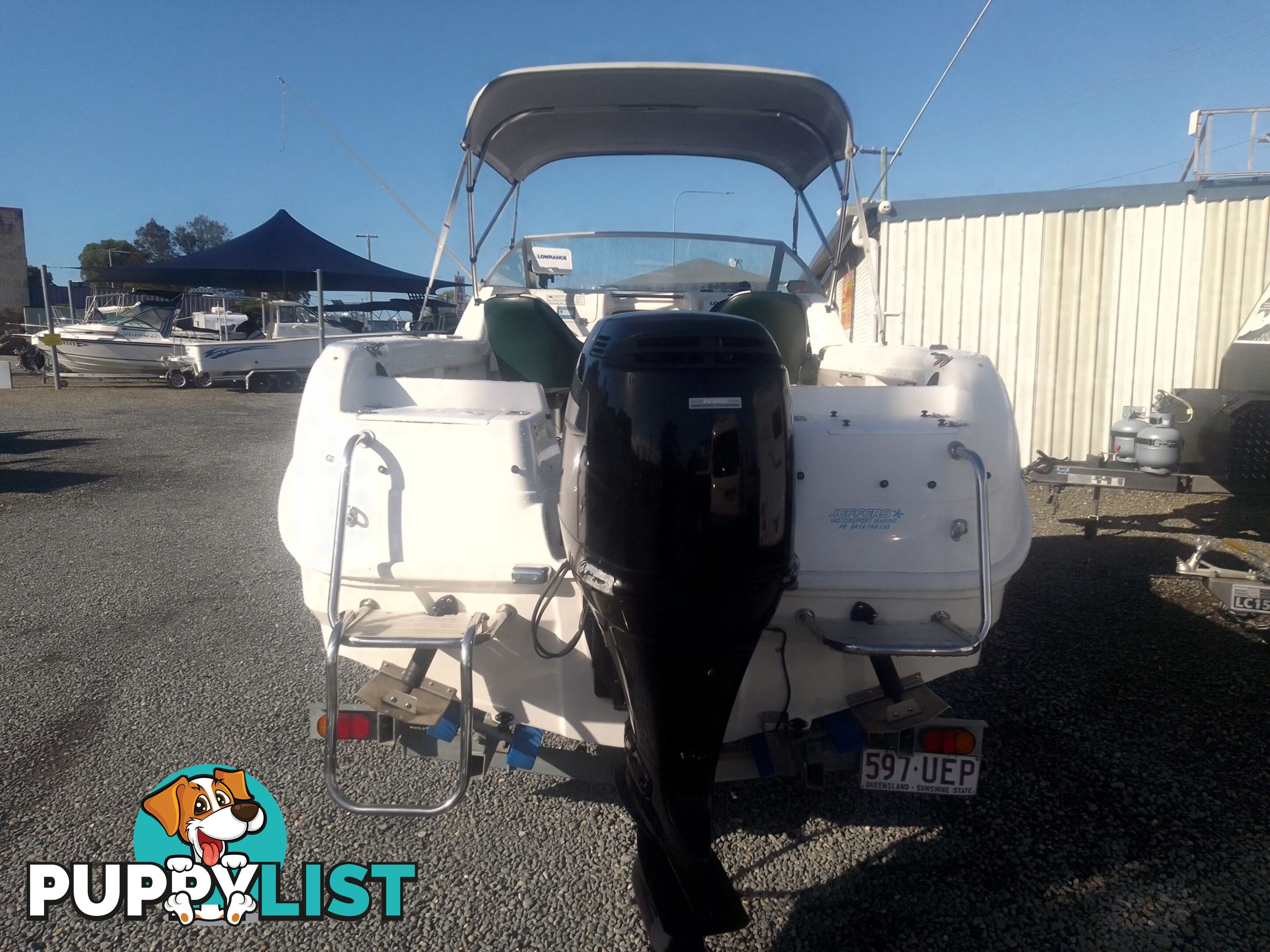 USED SAVAGE TASMAN 5.2 MT HALF CABIN 2005 POWERED BY A 115 HP SUZUKI 4 STROKE 2005 DONE 205 HOURS ON A 2017 MULTI ROLLER TRAILER