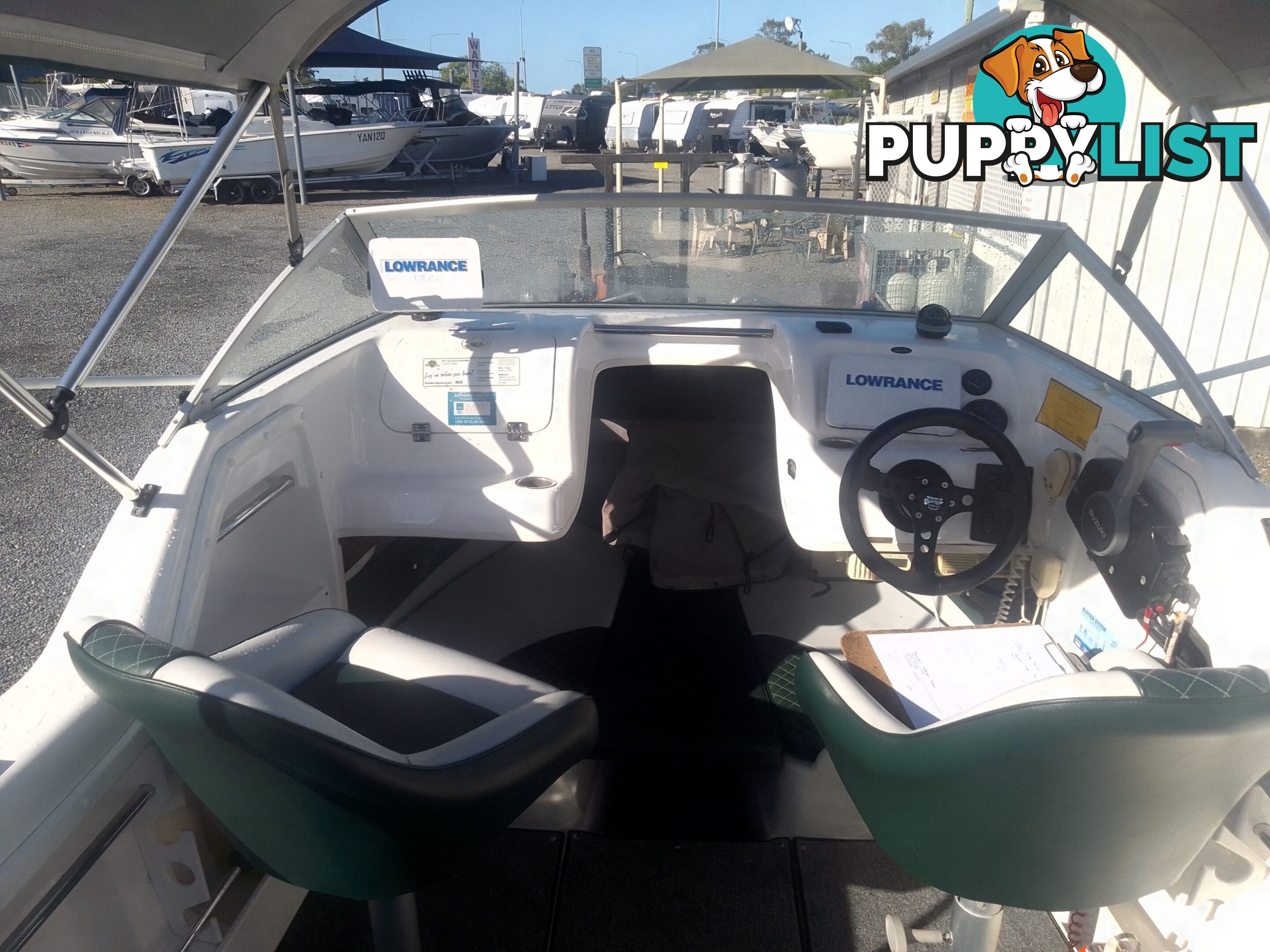 USED SAVAGE TASMAN 5.2 MT HALF CABIN 2005 POWERED BY A 115 HP SUZUKI 4 STROKE 2005 DONE 205 HOURS ON A 2017 MULTI ROLLER TRAILER