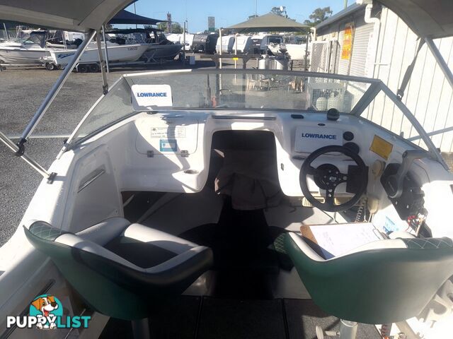 USED SAVAGE TASMAN 5.2 MT HALF CABIN 2005 POWERED BY A 115 HP SUZUKI 4 STROKE 2005 DONE 205 HOURS ON A 2017 MULTI ROLLER TRAILER