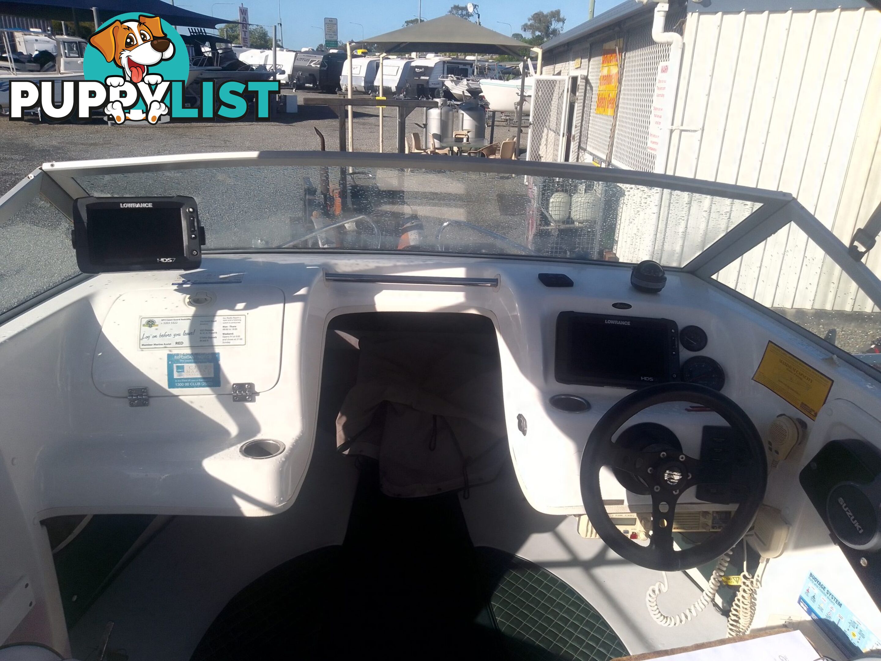 USED SAVAGE TASMAN 5.2 MT HALF CABIN 2005 POWERED BY A 115 HP SUZUKI 4 STROKE 2005 DONE 205 HOURS ON A 2017 MULTI ROLLER TRAILER