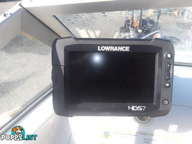 USED SAVAGE TASMAN 5.2 MT HALF CABIN 2005 POWERED BY A 115 HP SUZUKI 4 STROKE 2005 DONE 205 HOURS ON A 2017 MULTI ROLLER TRAILER