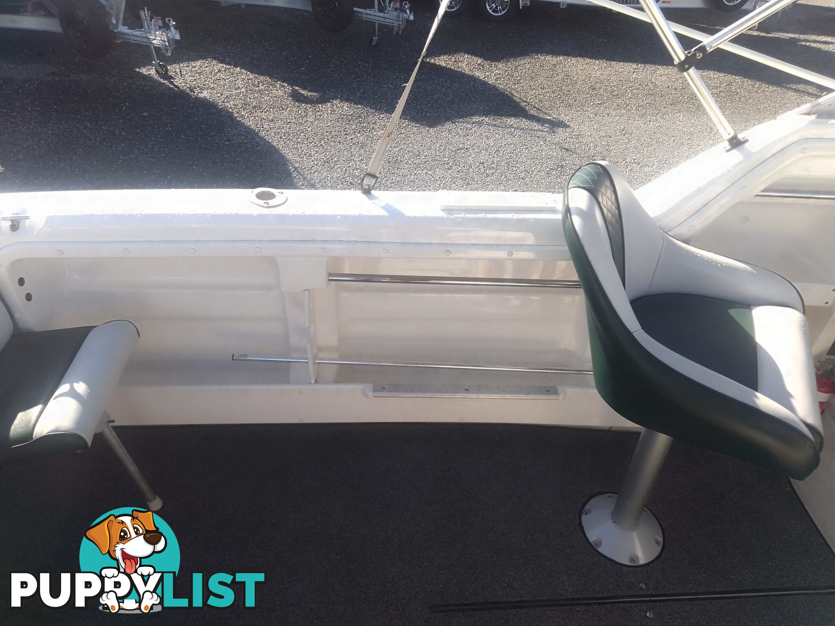 USED SAVAGE TASMAN 5.2 MT HALF CABIN 2005 POWERED BY A 115 HP SUZUKI 4 STROKE 2005 DONE 205 HOURS ON A 2017 MULTI ROLLER TRAILER