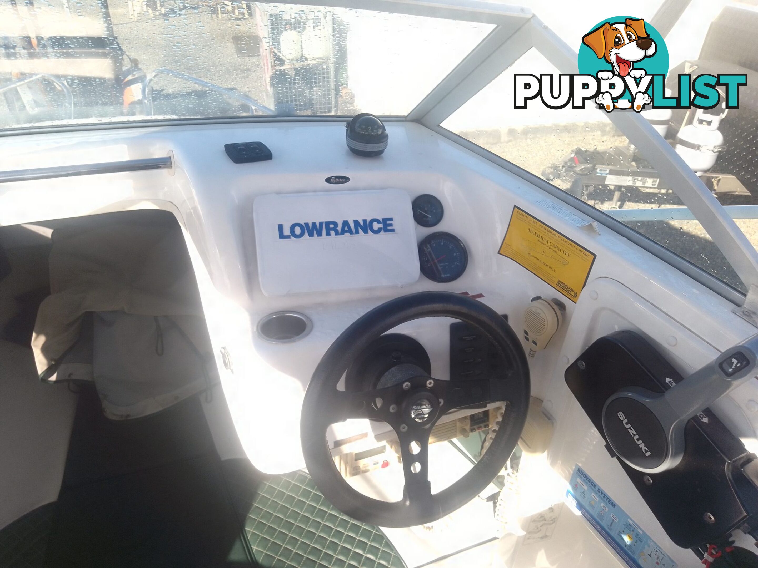 USED SAVAGE TASMAN 5.2 MT HALF CABIN 2005 POWERED BY A 115 HP SUZUKI 4 STROKE 2005 DONE 205 HOURS ON A 2017 MULTI ROLLER TRAILER