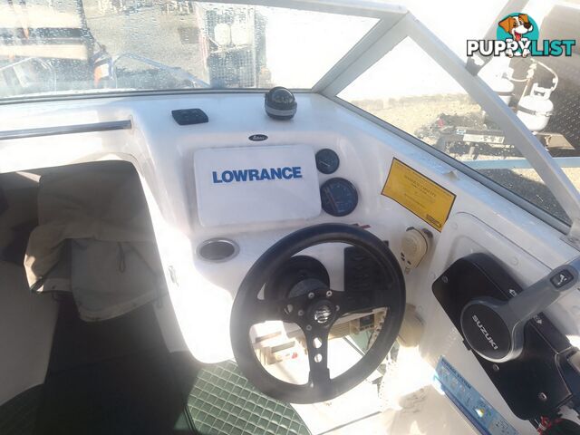 USED SAVAGE TASMAN 5.2 MT HALF CABIN 2005 POWERED BY A 115 HP SUZUKI 4 STROKE 2005 DONE 205 HOURS ON A 2017 MULTI ROLLER TRAILER