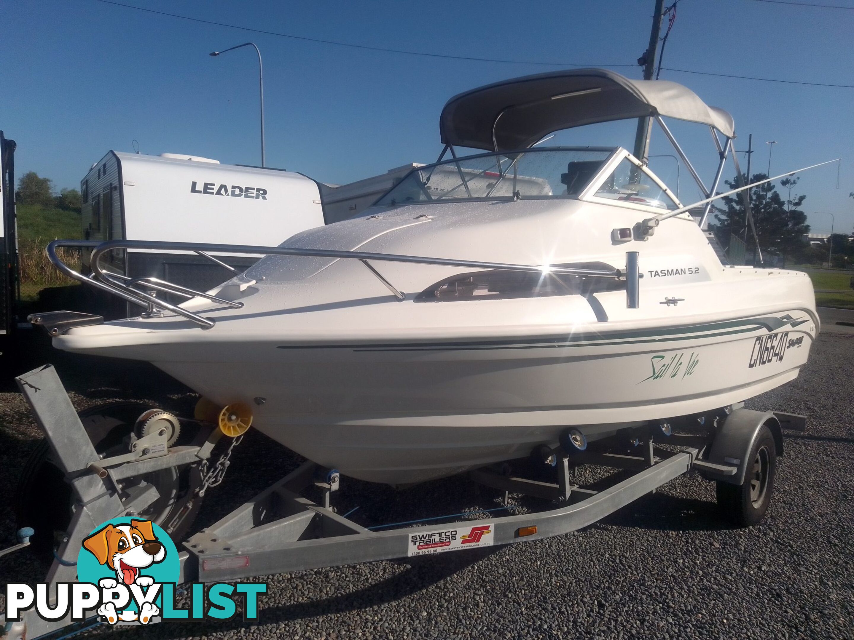 USED SAVAGE TASMAN 5.2 MT HALF CABIN 2005 POWERED BY A 115 HP SUZUKI 4 STROKE 2005 DONE 205 HOURS ON A 2017 MULTI ROLLER TRAILER