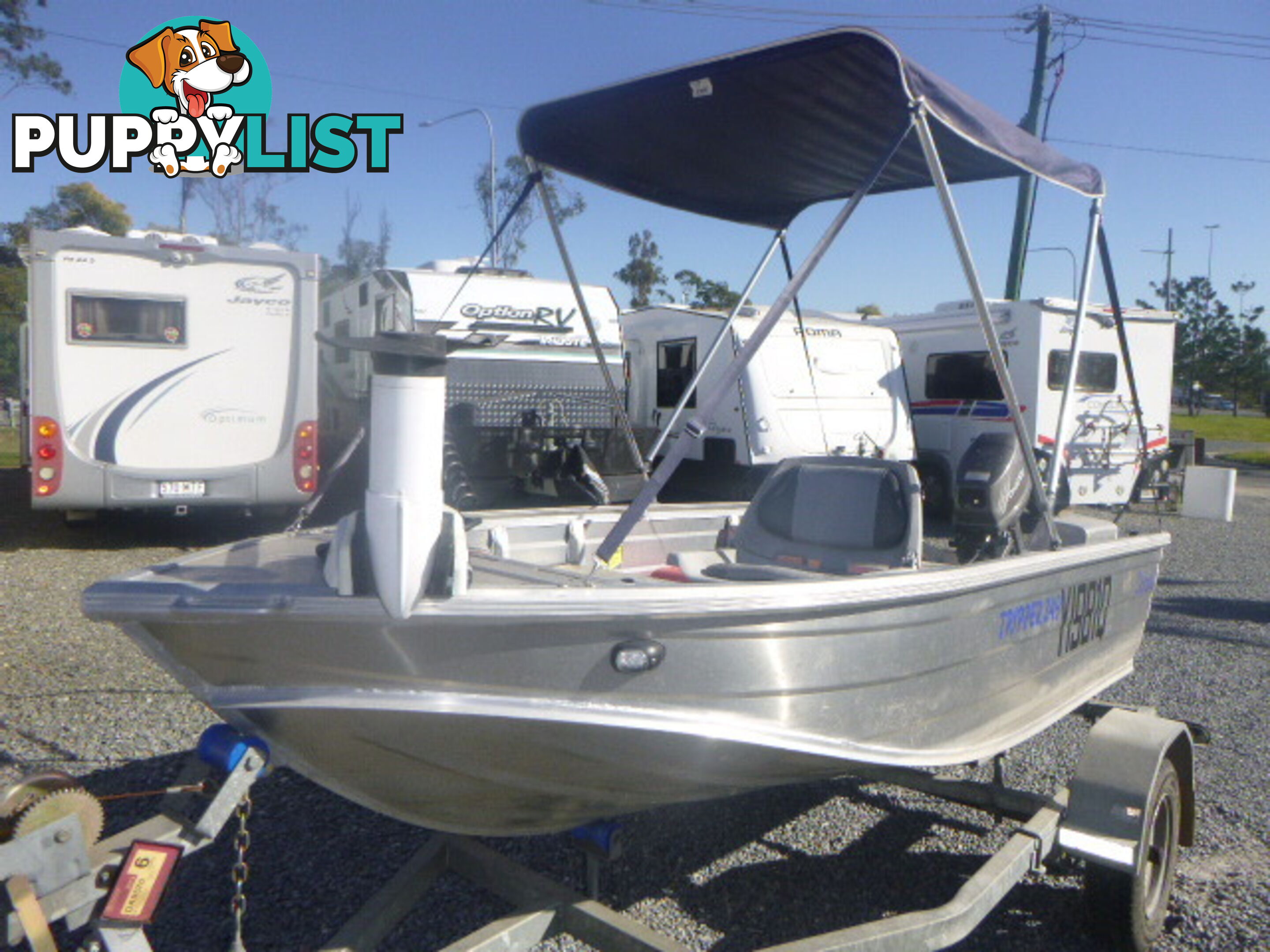 STESSCO TRIPPER 349 -18HP TOHATSU OUTBOARD & TRAILER