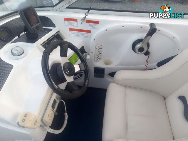 USED 2006 CRUISE CRAFT RESORT 55 BOWRIDER ON A 2005 REDCO TRAILER WITH A 2005 MODEL 150HP YAMAHA OUTBOARD.