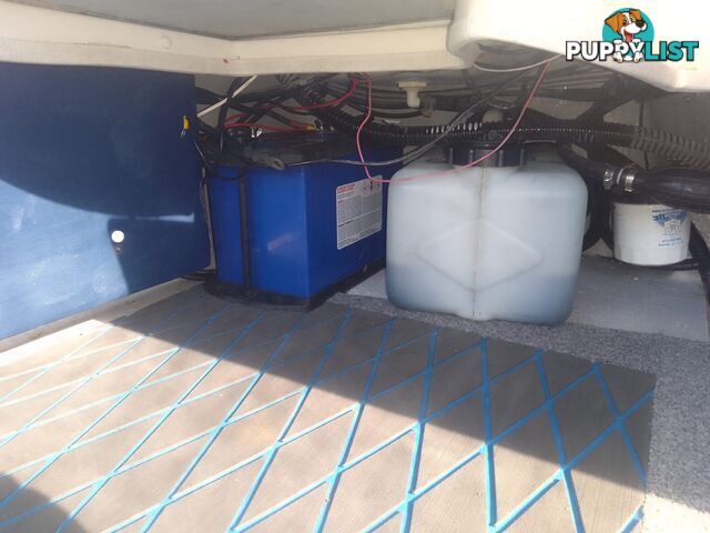 USED 2008 SAVAGE SURVEYOR HALF CABIN POWER BOAT ON A 2007 DUNBIER TRAILER WITH A 150HP MARINER EFI OUTBOARD MOTOR