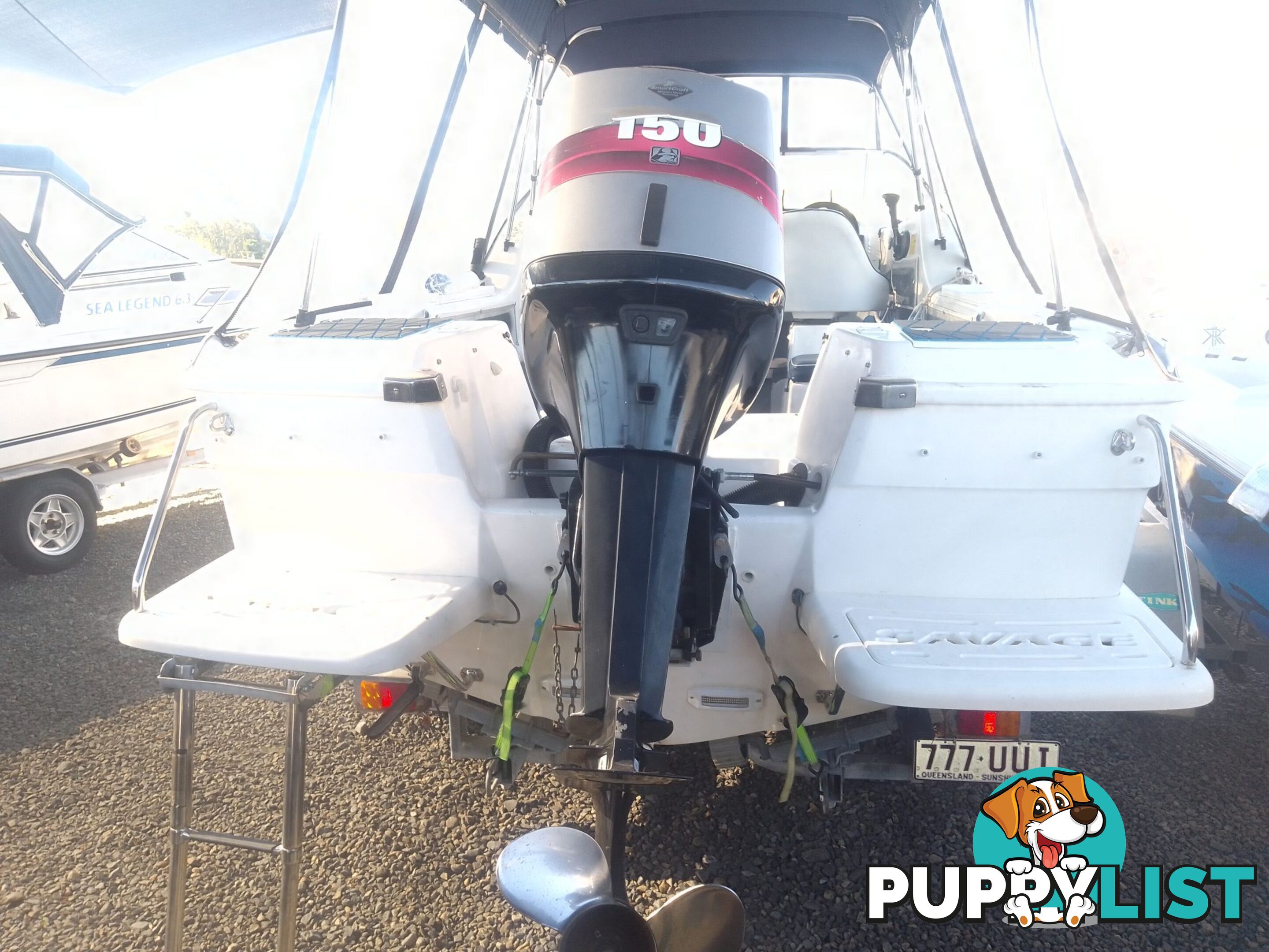 USED 2008 SAVAGE SURVEYOR HALF CABIN POWER BOAT ON A 2007 DUNBIER TRAILER WITH A 150HP MARINER EFI OUTBOARD MOTOR