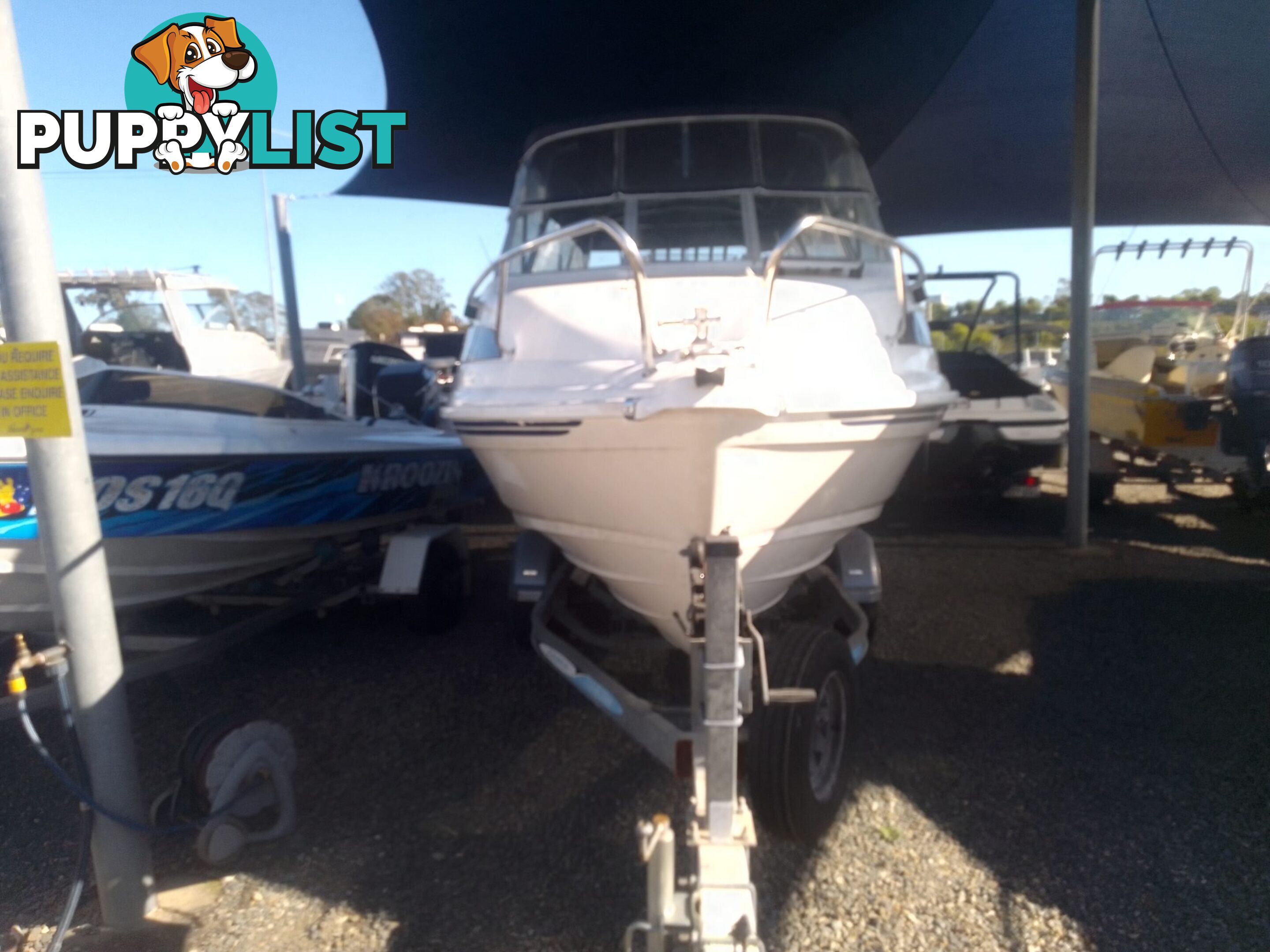 USED 2008 SAVAGE SURVEYOR HALF CABIN POWER BOAT ON A 2007 DUNBIER TRAILER WITH A 150HP MARINER EFI OUTBOARD MOTOR