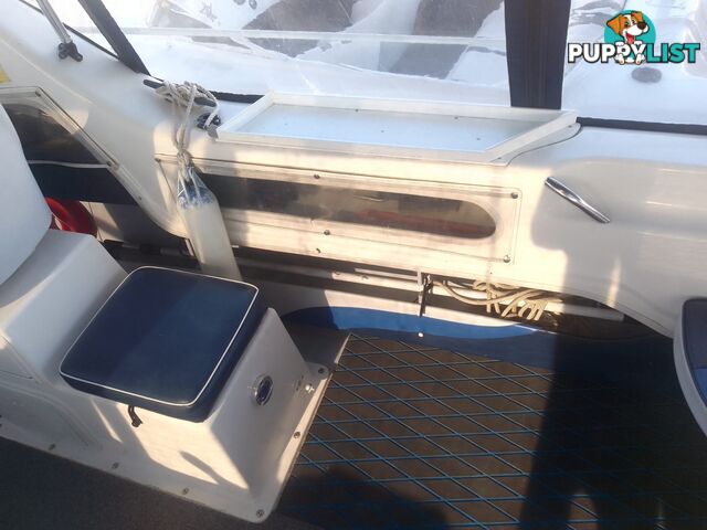USED 2008 SAVAGE SURVEYOR HALF CABIN POWER BOAT ON A 2007 DUNBIER TRAILER WITH A 150HP MARINER EFI OUTBOARD MOTOR