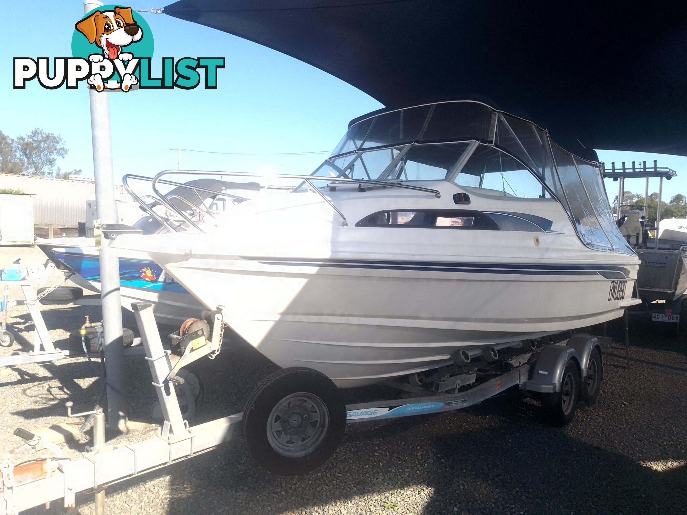 USED 2008 SAVAGE SURVEYOR HALF CABIN POWER BOAT ON A 2007 DUNBIER TRAILER WITH A 150HP MARINER EFI OUTBOARD MOTOR