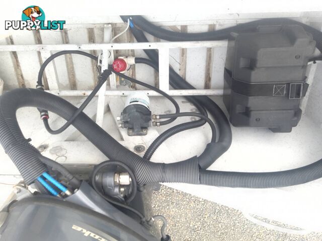 USED 2002 QUINTREX 4.2M CENTRE CONSOLE WIDE BODY DORY WITH A 40HP YAMAHA FOUR STROKE OUTBOARD ON A 2007 DUNBIER TRAILER.