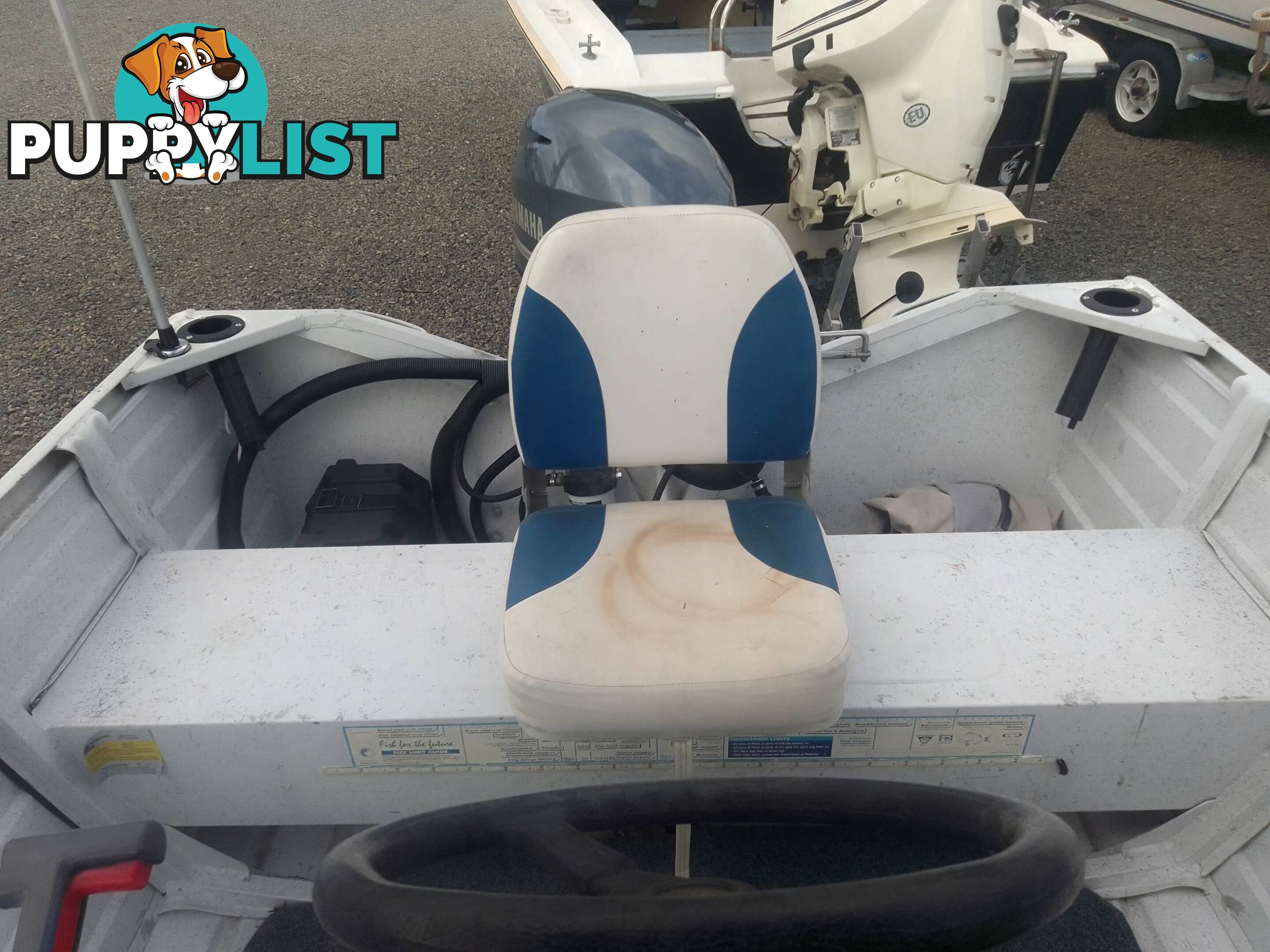 USED 2002 QUINTREX 4.2M CENTRE CONSOLE WIDE BODY DORY WITH A 40HP YAMAHA FOUR STROKE OUTBOARD ON A 2007 DUNBIER TRAILER.