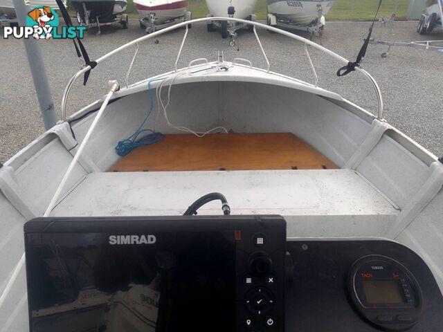 USED 2002 QUINTREX 4.2M CENTRE CONSOLE WIDE BODY DORY WITH A 40HP YAMAHA FOUR STROKE OUTBOARD ON A 2007 DUNBIER TRAILER.