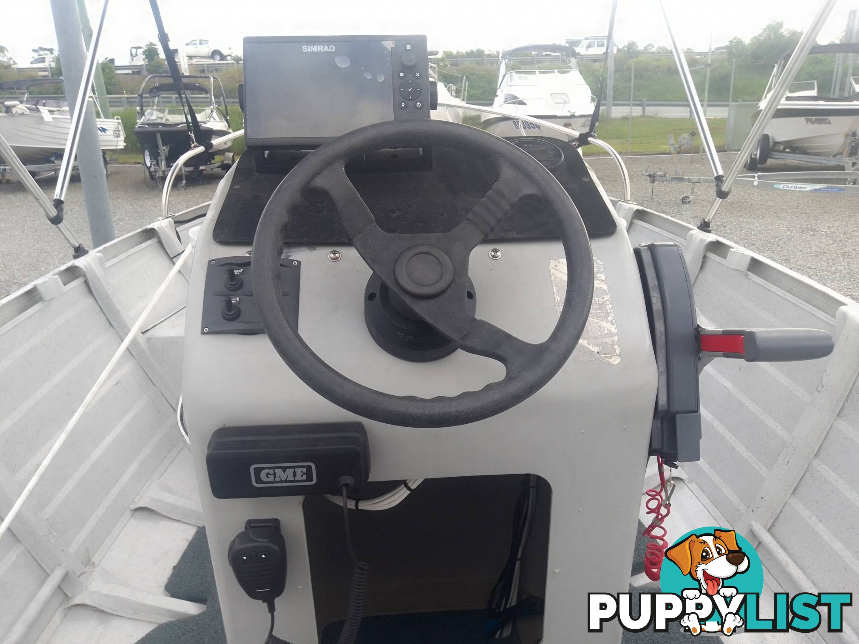 USED 2002 QUINTREX 4.2M CENTRE CONSOLE WIDE BODY DORY WITH A 40HP YAMAHA FOUR STROKE OUTBOARD ON A 2007 DUNBIER TRAILER.