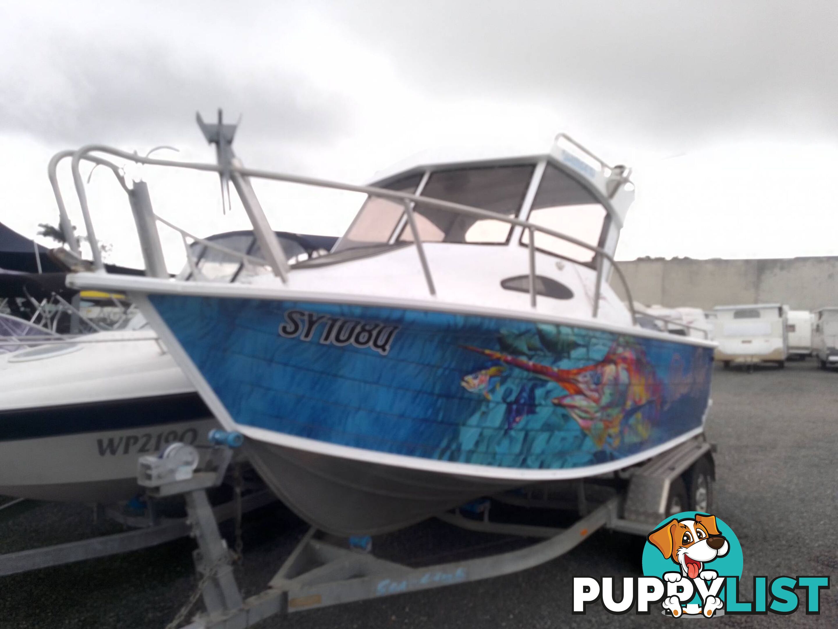 QUINTREX 610 OFFSHORE HALF CABIN-YAMAHA 225HP 4 STROKE AND TRAILER