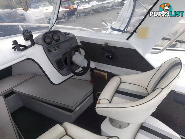 QUINTREX 610 OFFSHORE HALF CABIN-YAMAHA 225HP 4 STROKE AND TRAILER