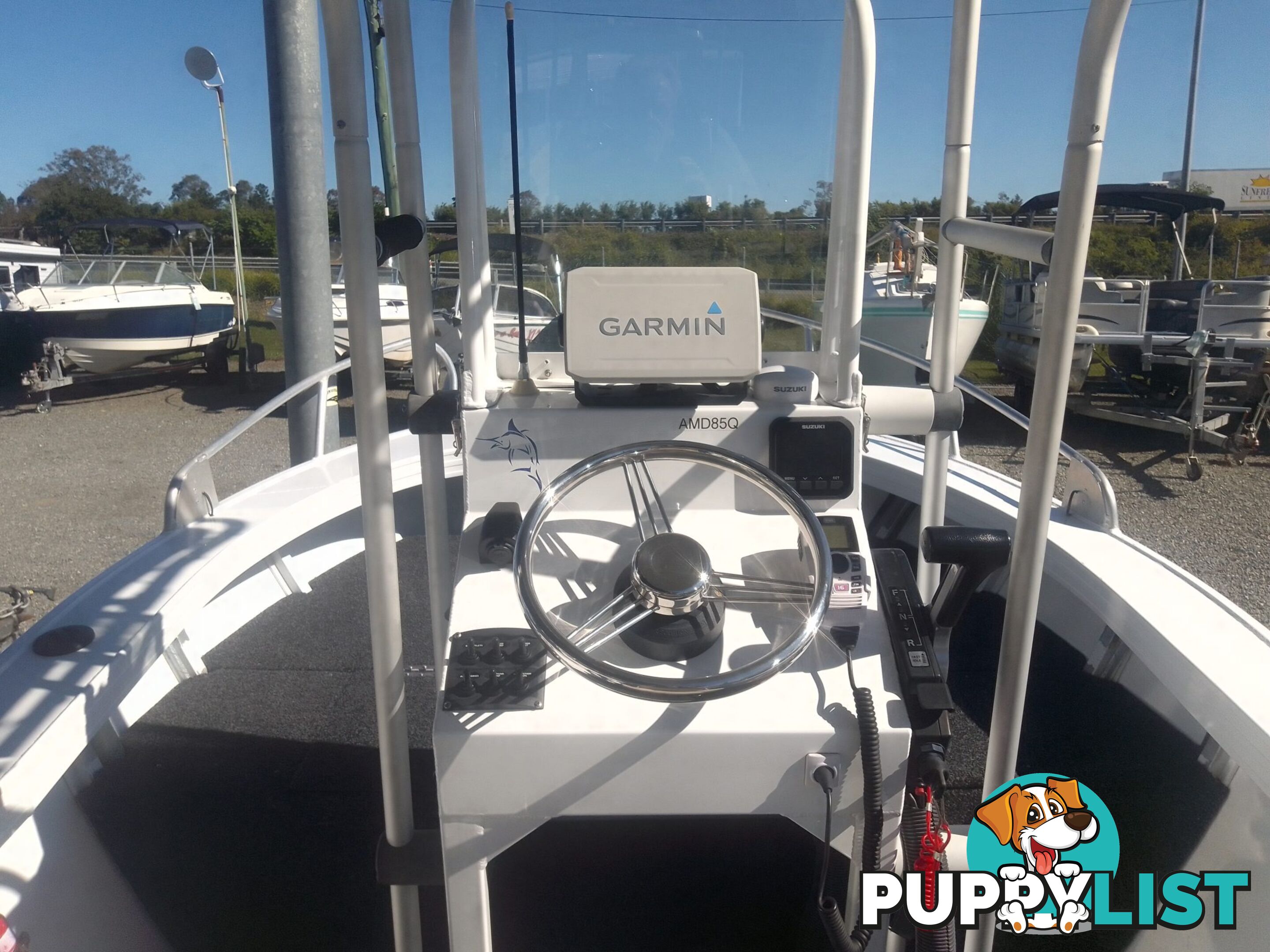 USED 2019 AQUAMASTER 490 CENTRE CONSOLE WITH A 2019 80HP SUZUKI 4 STROKE OUTBOARD ON A MARFAIR MARINE SINGLE AXLE TRAILER