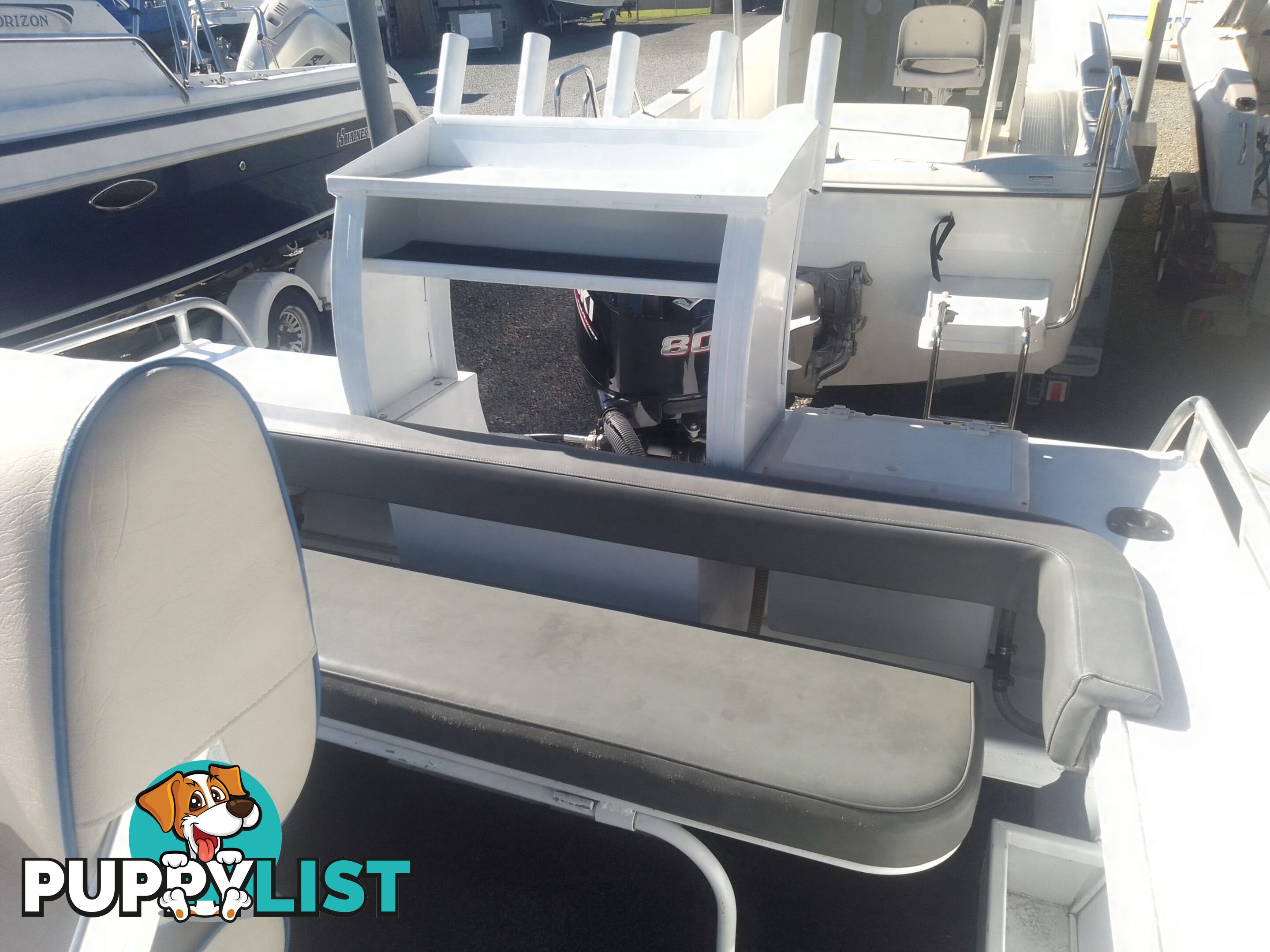 USED 2019 AQUAMASTER 490 CENTRE CONSOLE WITH A 2019 80HP SUZUKI 4 STROKE OUTBOARD ON A MARFAIR MARINE SINGLE AXLE TRAILER