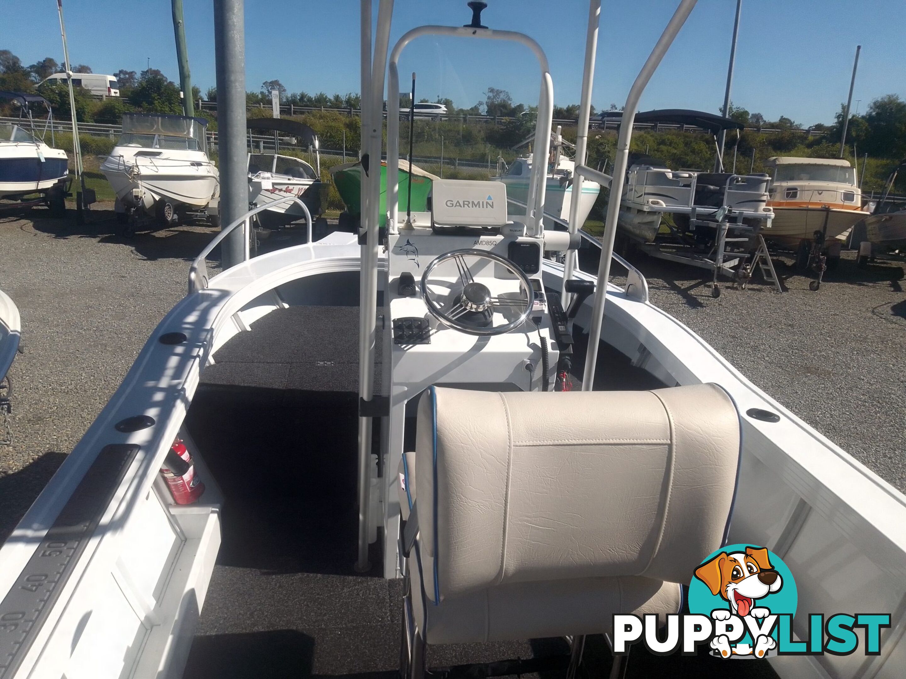 USED 2019 AQUAMASTER 490 CENTRE CONSOLE WITH A 2019 80HP SUZUKI 4 STROKE OUTBOARD ON A MARFAIR MARINE SINGLE AXLE TRAILER