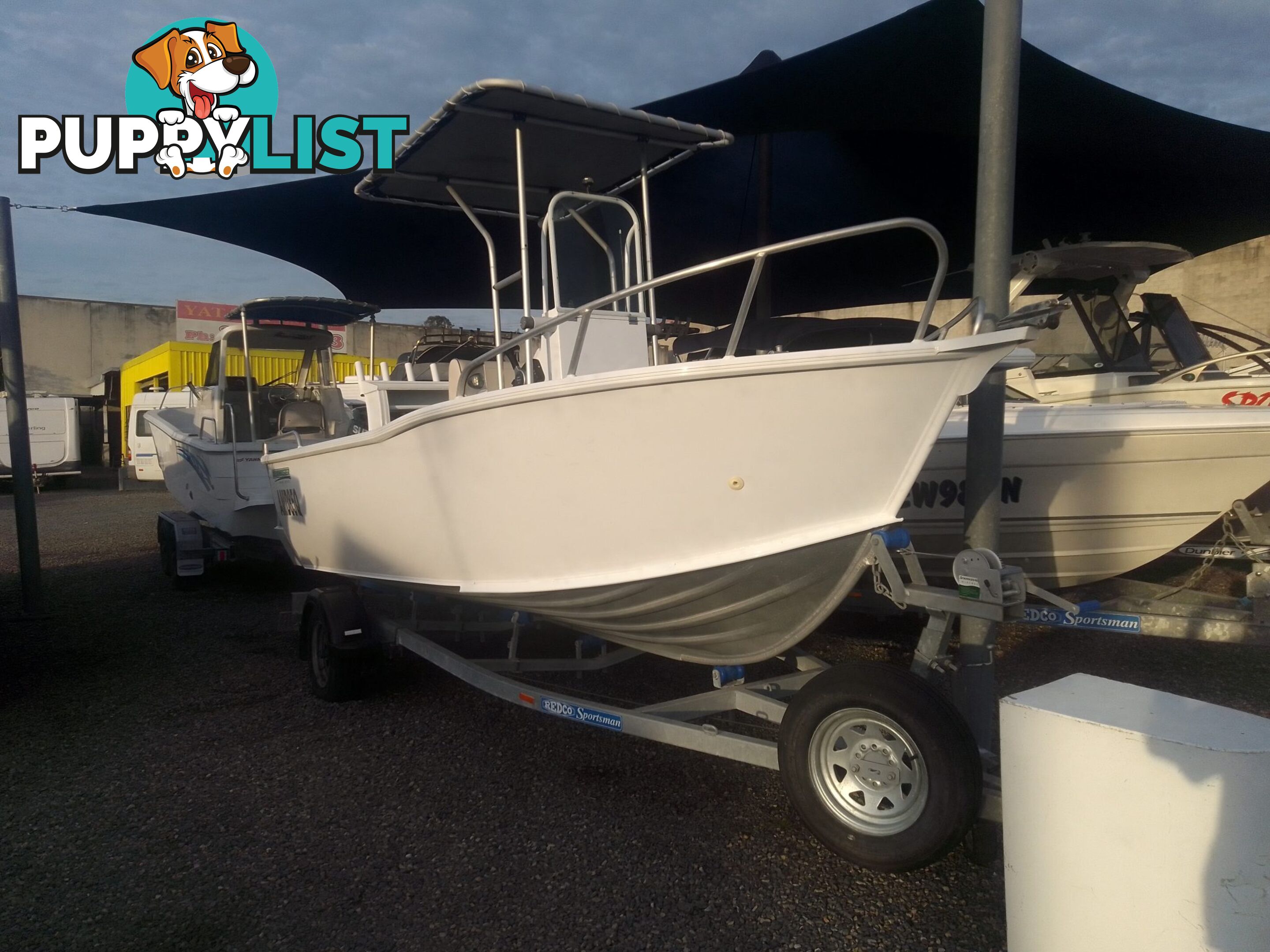 USED 2019 AQUAMASTER 490 CENTRE CONSOLE WITH A 2019 80HP SUZUKI 4 STROKE OUTBOARD ON A MARFAIR MARINE SINGLE AXLE TRAILER