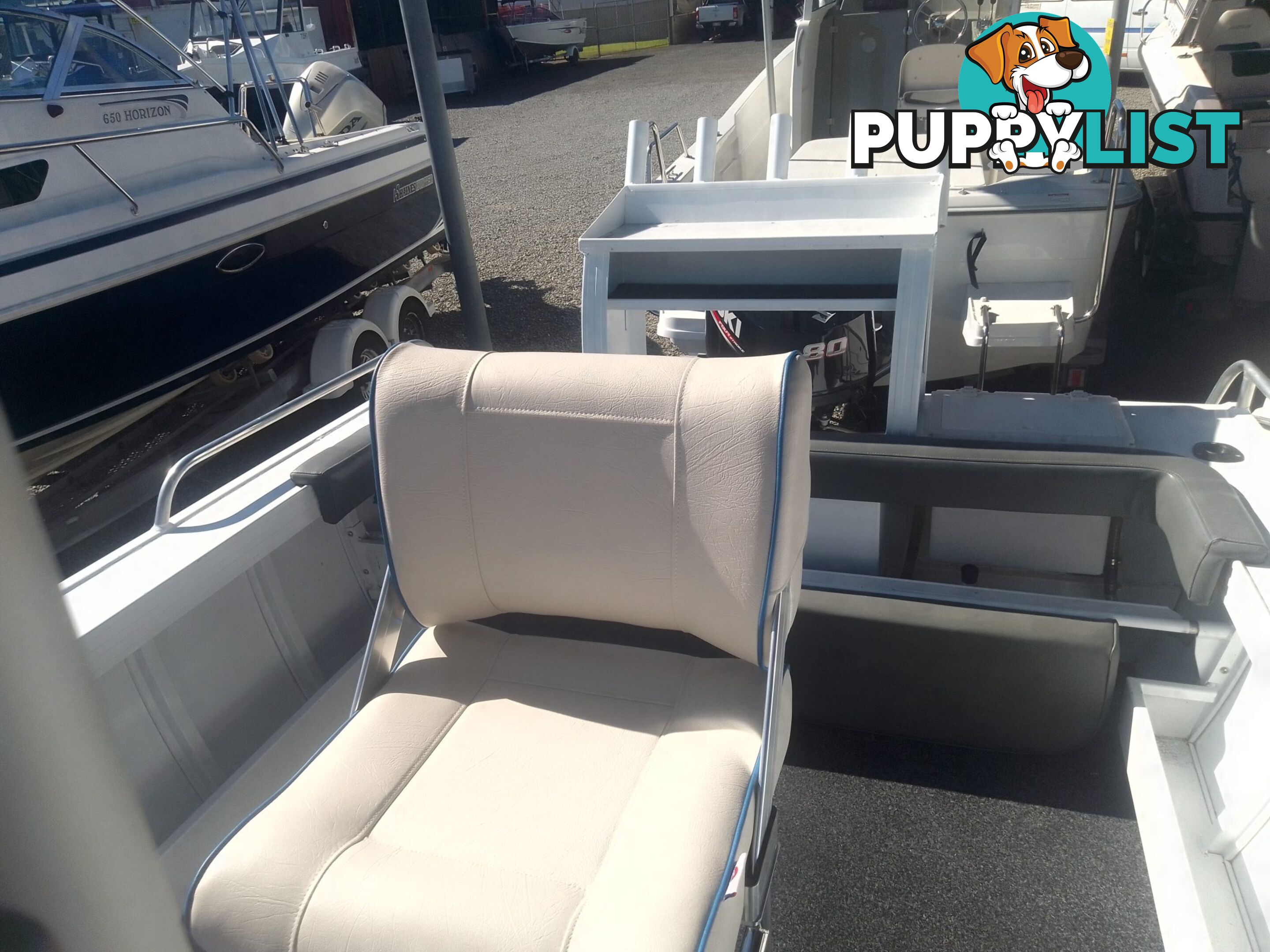 USED 2019 AQUAMASTER 490 CENTRE CONSOLE WITH A 2019 80HP SUZUKI 4 STROKE OUTBOARD ON A MARFAIR MARINE SINGLE AXLE TRAILER