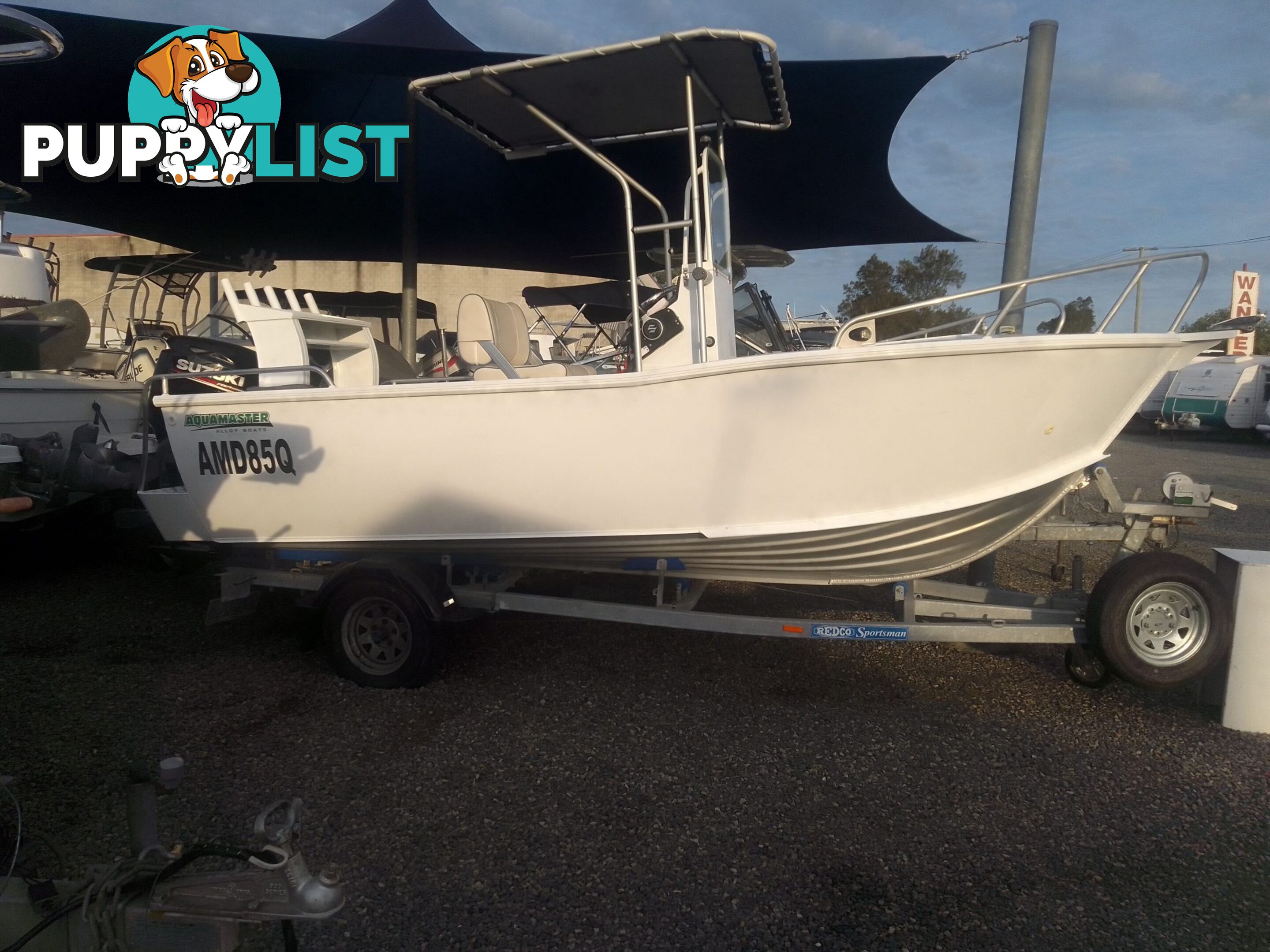 USED 2019 AQUAMASTER 490 CENTRE CONSOLE WITH A 2019 80HP SUZUKI 4 STROKE OUTBOARD ON A MARFAIR MARINE SINGLE AXLE TRAILER