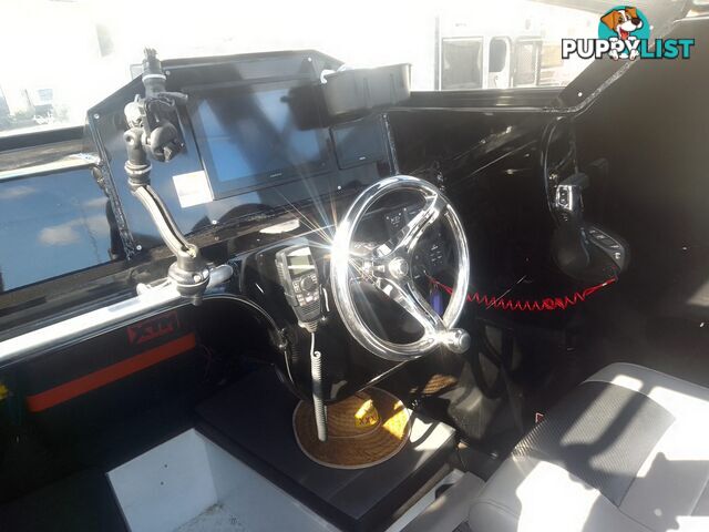 USED 2022 STESSL 660 COASTRUNNER MAGNUM CENTRE CABIN WITH A V6 225HP YAMAHA FOUR STROKE ENGINE ON A DUNBIER DUAL AXLE TRAILER