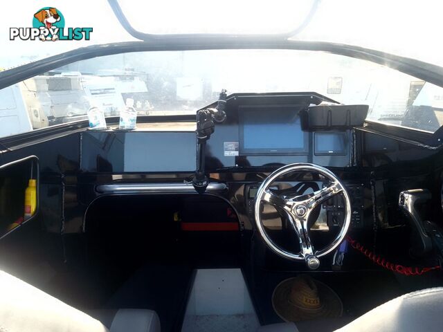 USED 2022 STESSL 660 COASTRUNNER MAGNUM CENTRE CABIN WITH A V6 225HP YAMAHA FOUR STROKE ENGINE ON A DUNBIER DUAL AXLE TRAILER