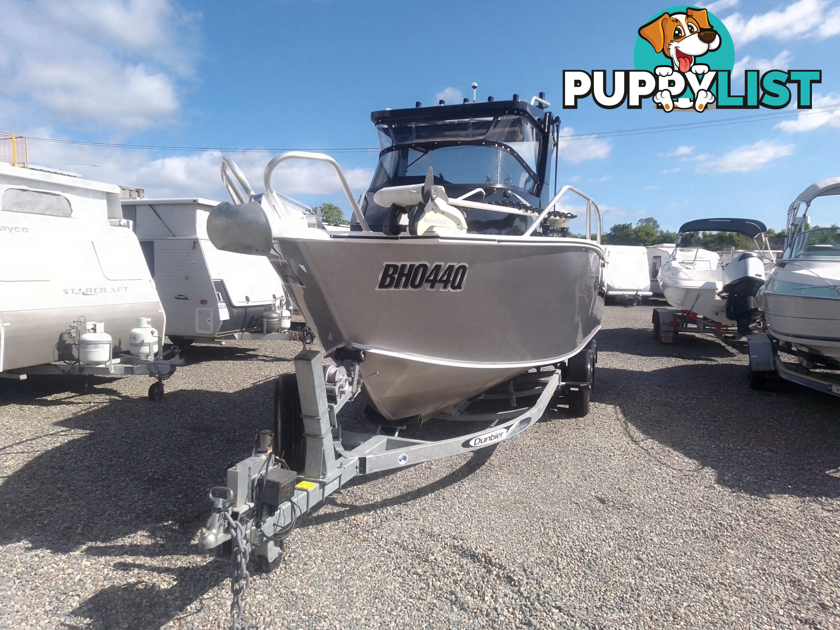 USED 2022 STESSL 660 COASTRUNNER MAGNUM CENTRE CABIN WITH A V6 225HP YAMAHA FOUR STROKE ENGINE ON A DUNBIER DUAL AXLE TRAILER