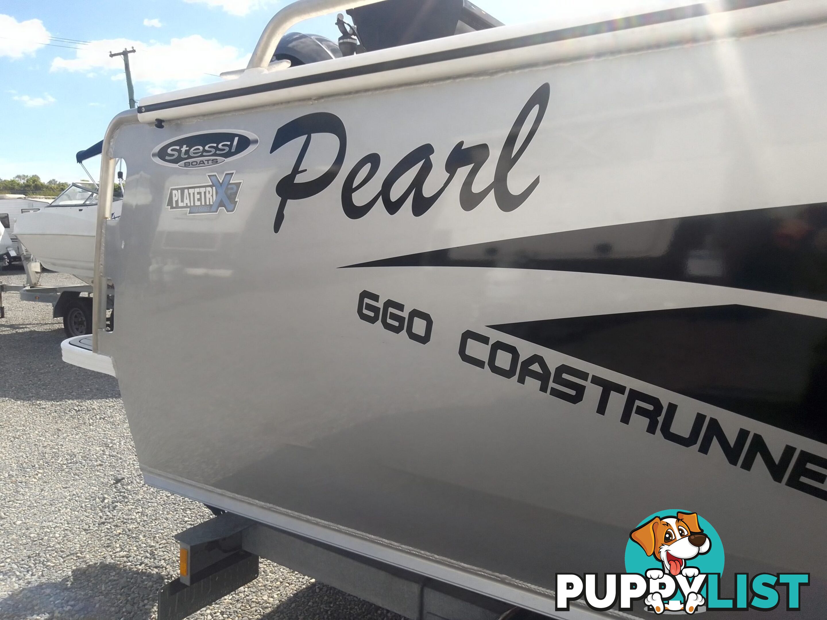 USED 2022 STESSL 660 COASTRUNNER MAGNUM CENTRE CABIN WITH A V6 225HP YAMAHA FOUR STROKE ENGINE ON A DUNBIER DUAL AXLE TRAILER