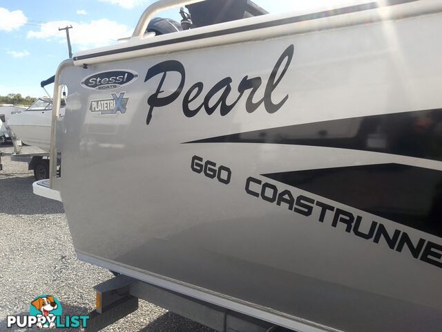USED 2022 STESSL 660 COASTRUNNER MAGNUM CENTRE CABIN WITH A V6 225HP YAMAHA FOUR STROKE ENGINE ON A DUNBIER DUAL AXLE TRAILER