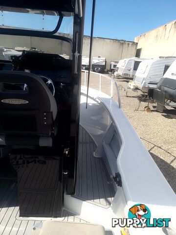 USED 2022 STESSL 660 COASTRUNNER MAGNUM CENTRE CABIN WITH A V6 225HP YAMAHA FOUR STROKE ENGINE ON A DUNBIER DUAL AXLE TRAILER