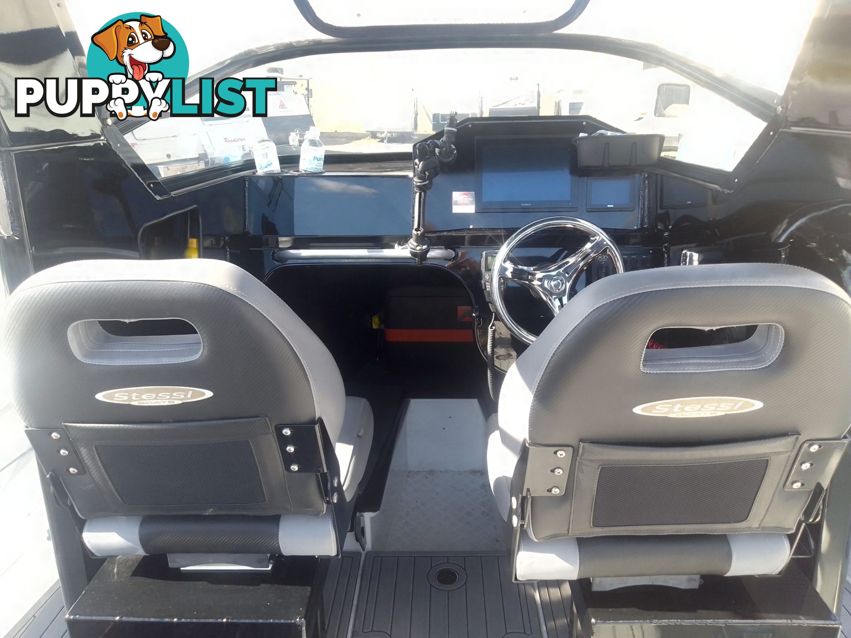USED 2022 STESSL 660 COASTRUNNER MAGNUM CENTRE CABIN WITH A V6 225HP YAMAHA FOUR STROKE ENGINE ON A DUNBIER DUAL AXLE TRAILER