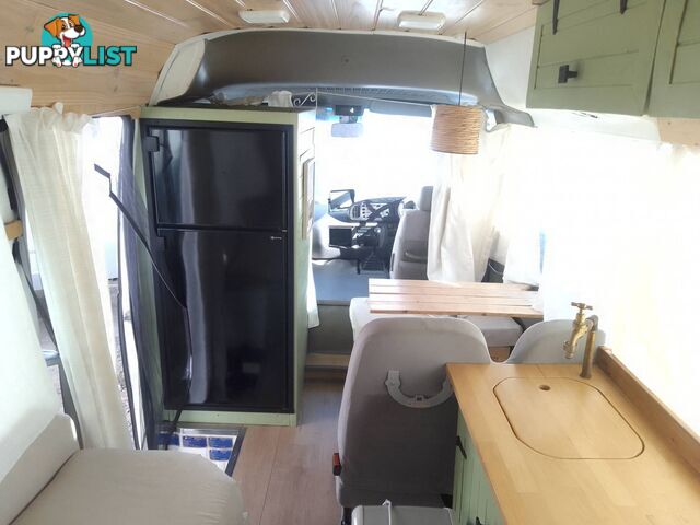 TOYOTA COASTER BUS DIESEL 6.6M TOURING MOTORHOME