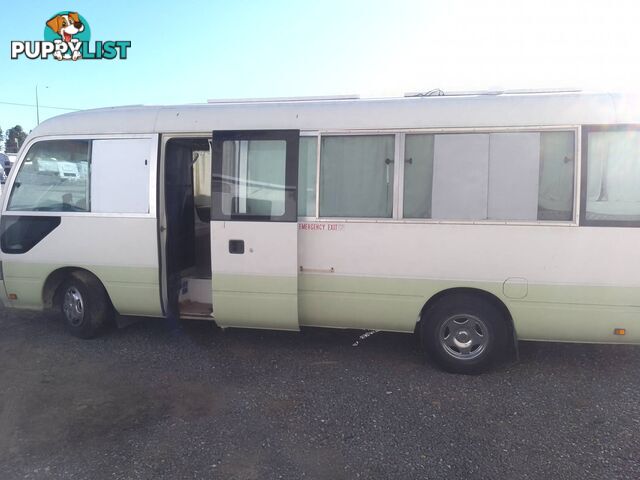 TOYOTA COASTER BUS DIESEL 6.6M TOURING MOTORHOME