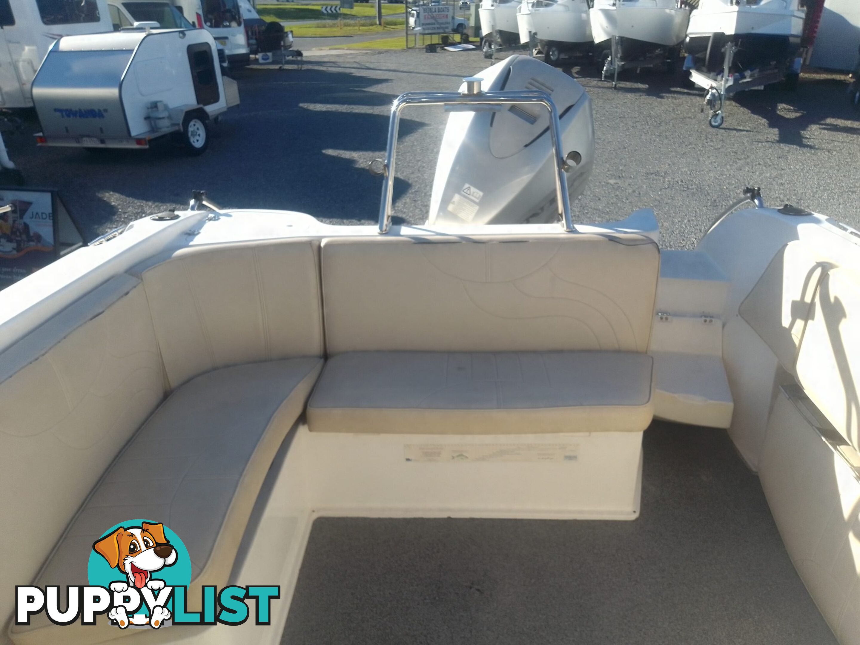 USED 2005 HAINES HUNTER 650 HORIZON HALF CABIN ON A 2005 EASYTOW DUAL AXLE TRAILER WITH A 215HP HONDA 4 STROKE OUTBOARD